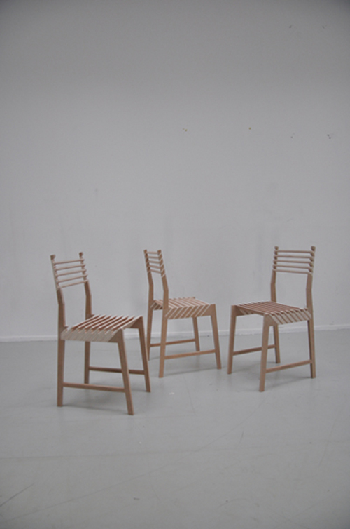 Chaise triplette par Paul Menand Chaise triplette par Paul Menand